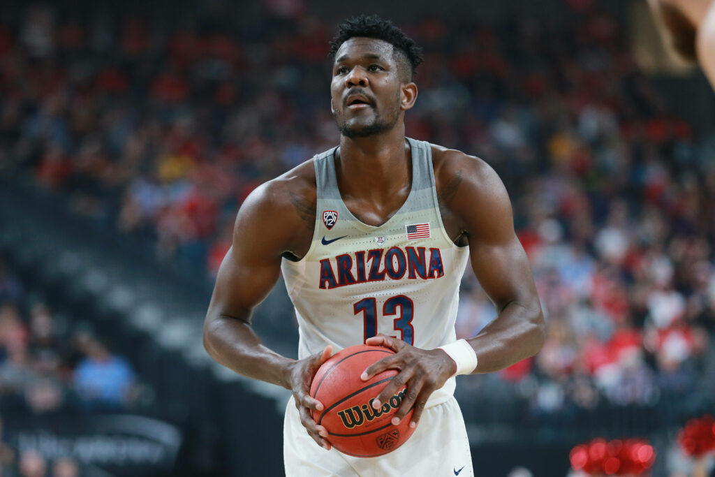 Deandre Ayton Arizona Wildcats focused free throw NCAA Basketball intense stadium background wallpaper