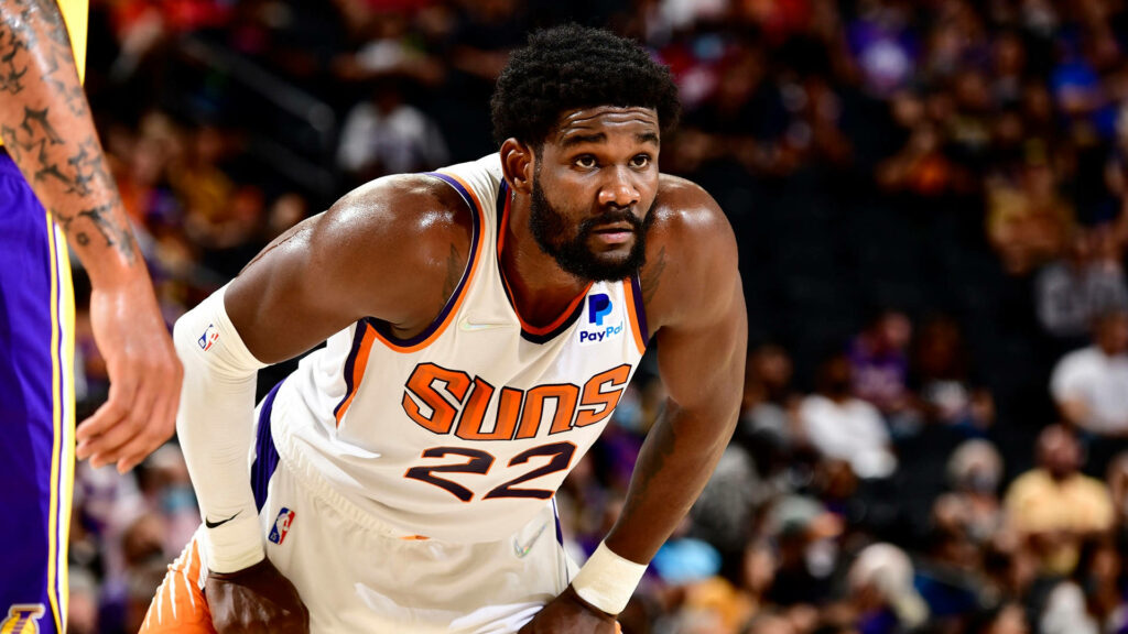 Deandre Ayton Phoenix Suns NBA action wallpaper vibrant arena focus athletic energy