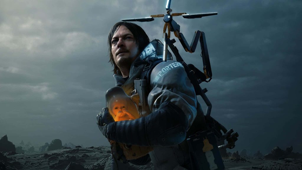 Norman Reedus as Sam Porter Bridges holding glowing Baby in moody Death Stranding PC wallpaper
