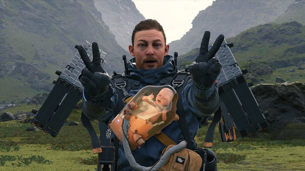 Death Stranding Sam Porter Bridges double peace sign carrying BB pod rugged mountain wallpaper