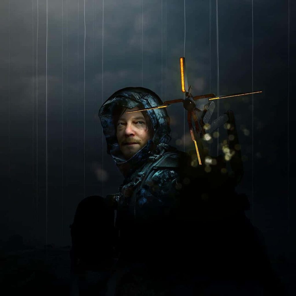 Sam Porter Bridges in rain with glowing Odradek scanner Death Stranding cinematic wallpaper