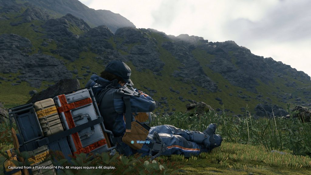 Sam Porter Bridges sleeping on mossy mountain slope Death Stranding 4K cinematic wallpaper background