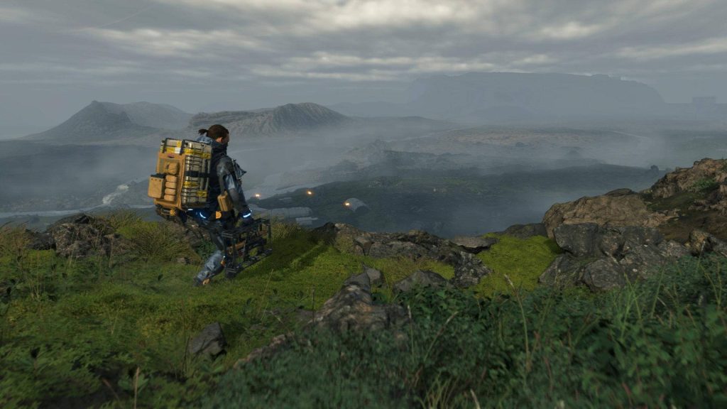 Sam Porter Bridges on mossy cliff overlooking misty landscape Death Stranding wallpaper background