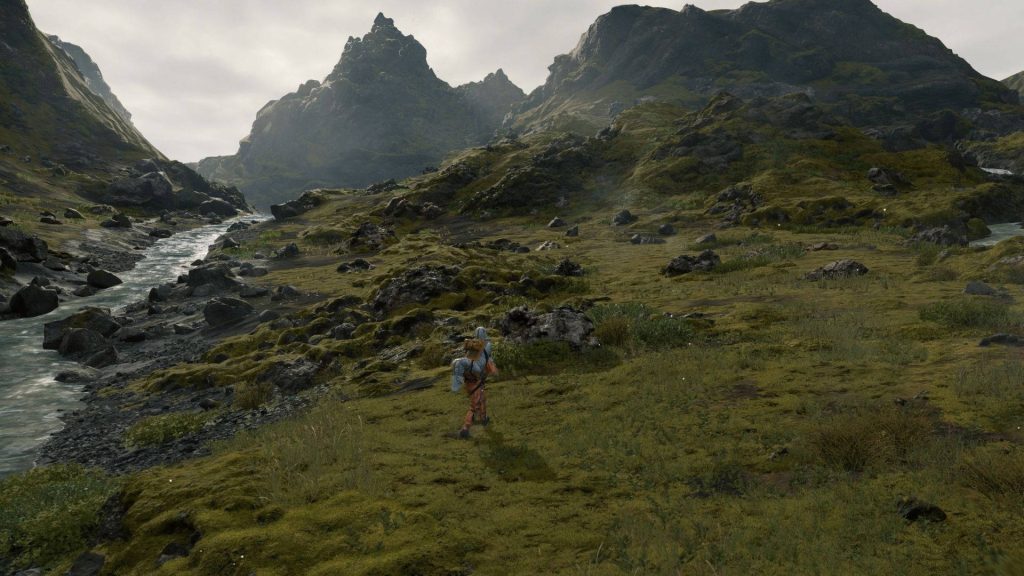 Sam Porter Bridges trekking mossy valley river Death Stranding wallpaper mountains overcast sky