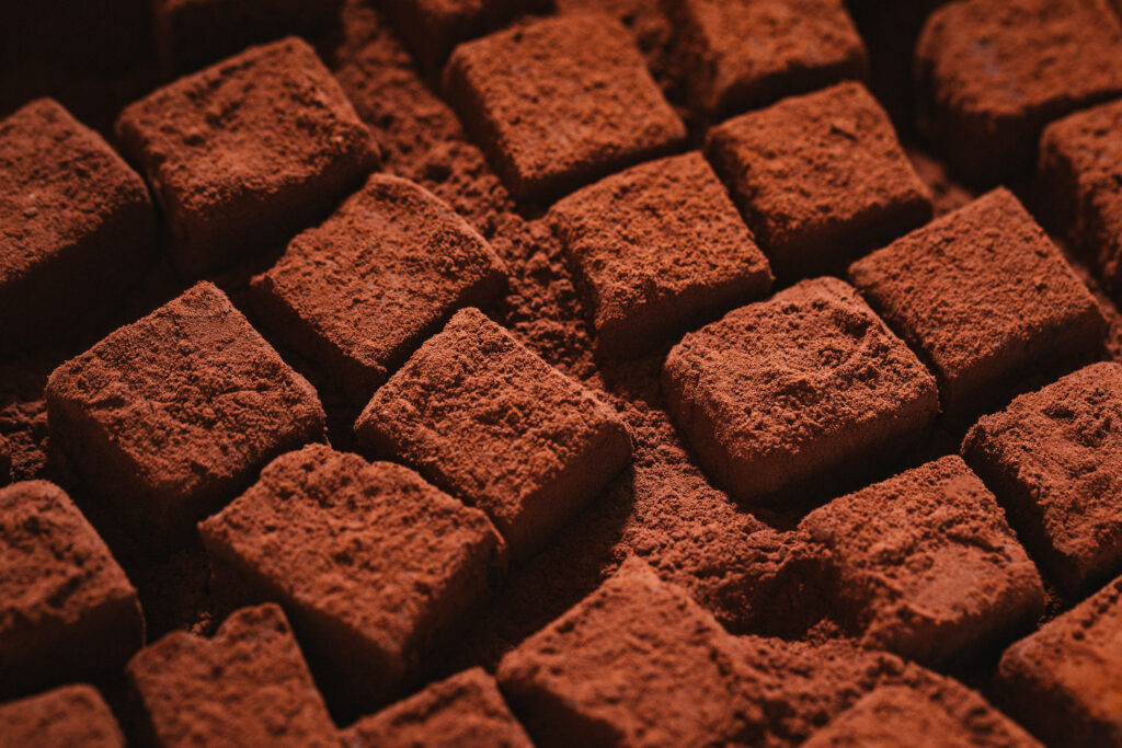 Decadent Chocolate Cubes with Cocoa: Macro Dessert Wallpaper
