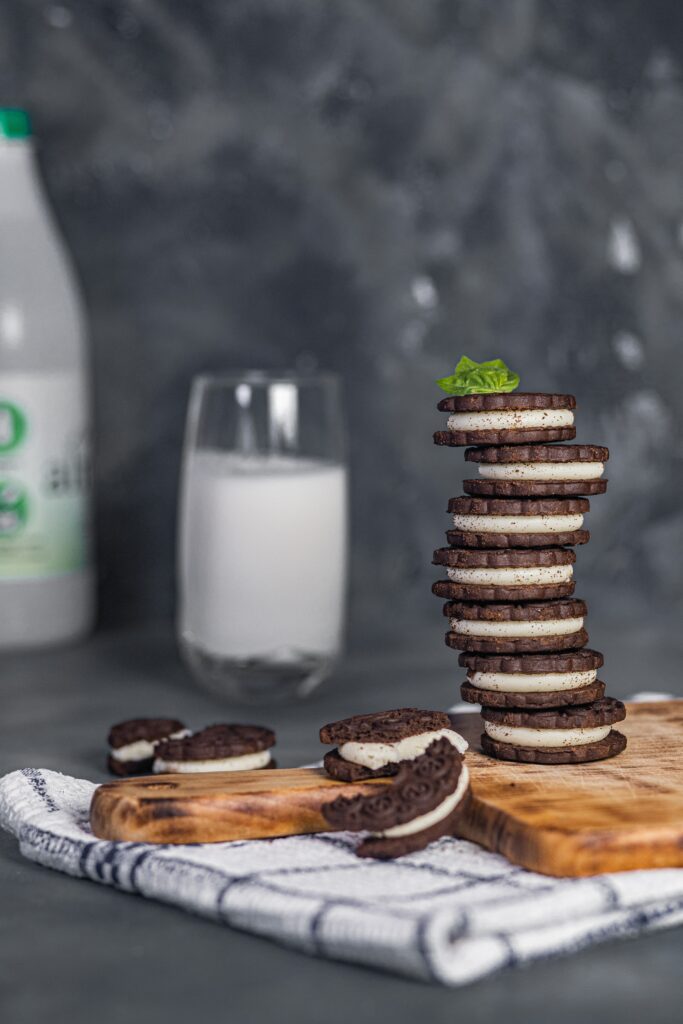 Indulge in Chocolate Sandwich Cookies & Milk Wallpaper Background