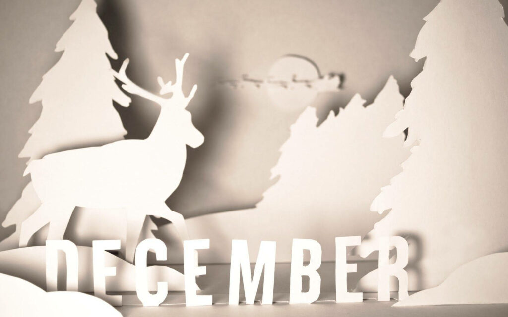 Minimalist December winter forest wallpaper with paper cutout reindeer and snowy trees background
