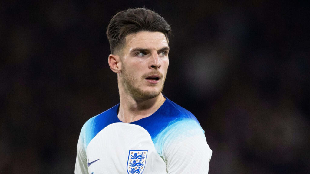 Declan Rice focused in England soccer kit dynamic wallpaper key midfielder athletic presence