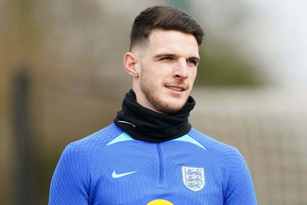Declan Rice focused in blue England training kit with crest and Nike logo outdoors training session Wallpaper