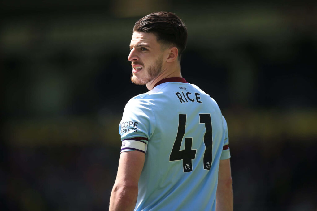 Declan Rice in West Ham United sky blue kit number 41 focused in action Premier League midfielder Wallpaper