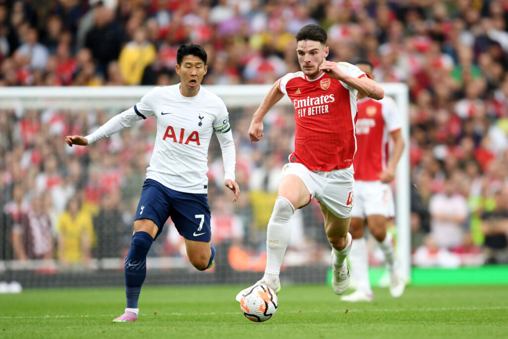 Declan Rice Arsenal and Son Heung-min Tottenham Hotspur in dynamic football match wallpaper background