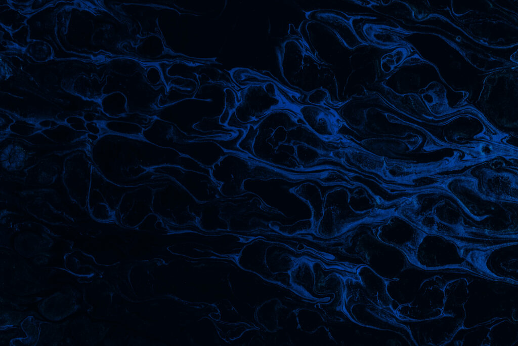 Indigo Dreams: A Captivating Navy Blue Water Art Wallpaper