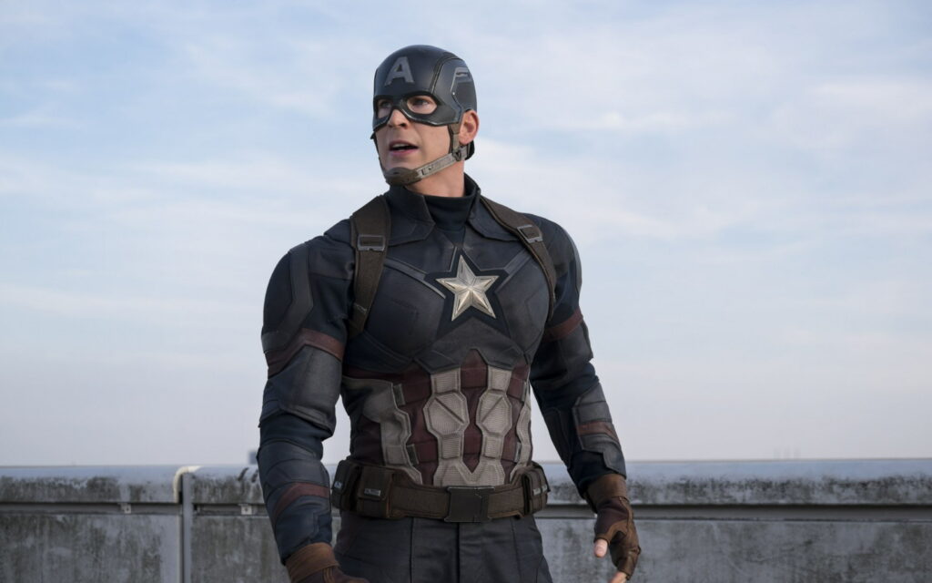Chris Evans as Captain America in detailed superhero costume - patriotic, brave, ready for action Wallpaper