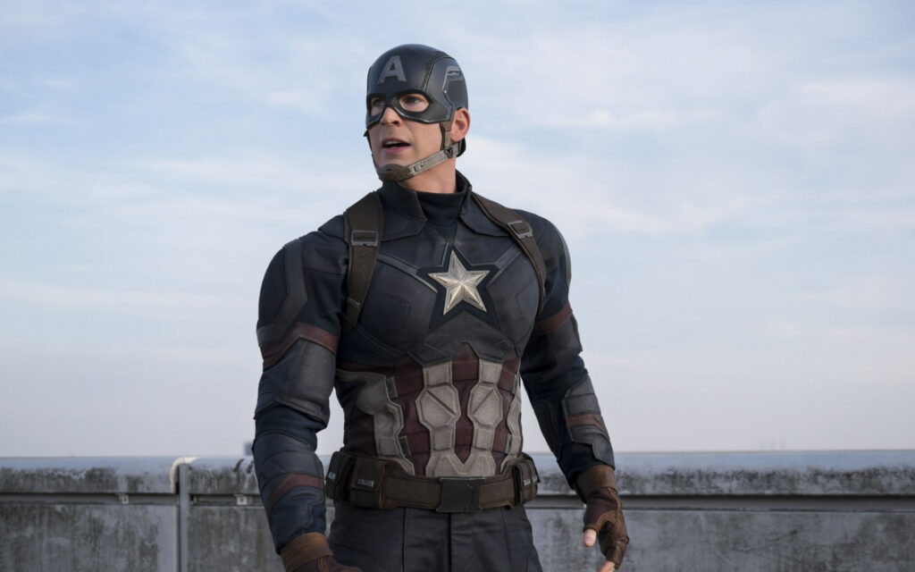 Captain America Chris Evans in detailed tactical suit heroic pose bright sky Marvel wallpaper
