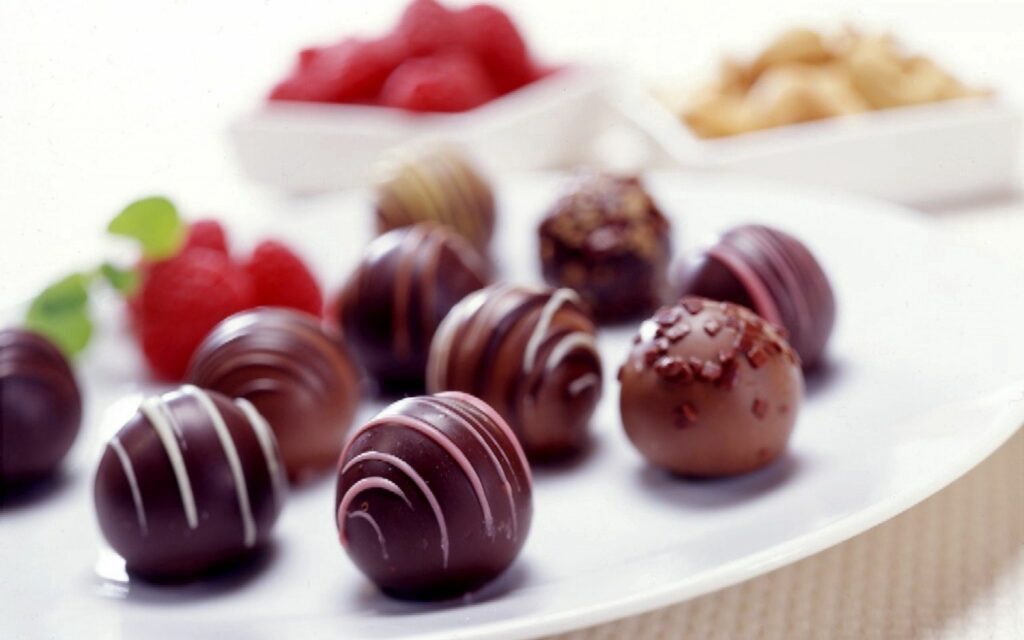 Elegant Chocolate Candy Wallpaper with Berries & Nuts Delight