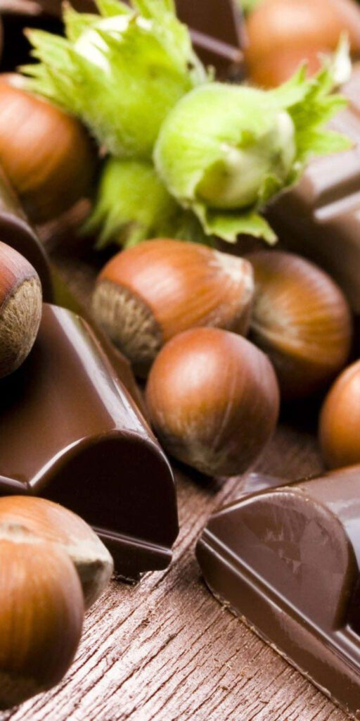 Delectable Chocolate & Hazelnuts Close-Up Wallpaper Background
