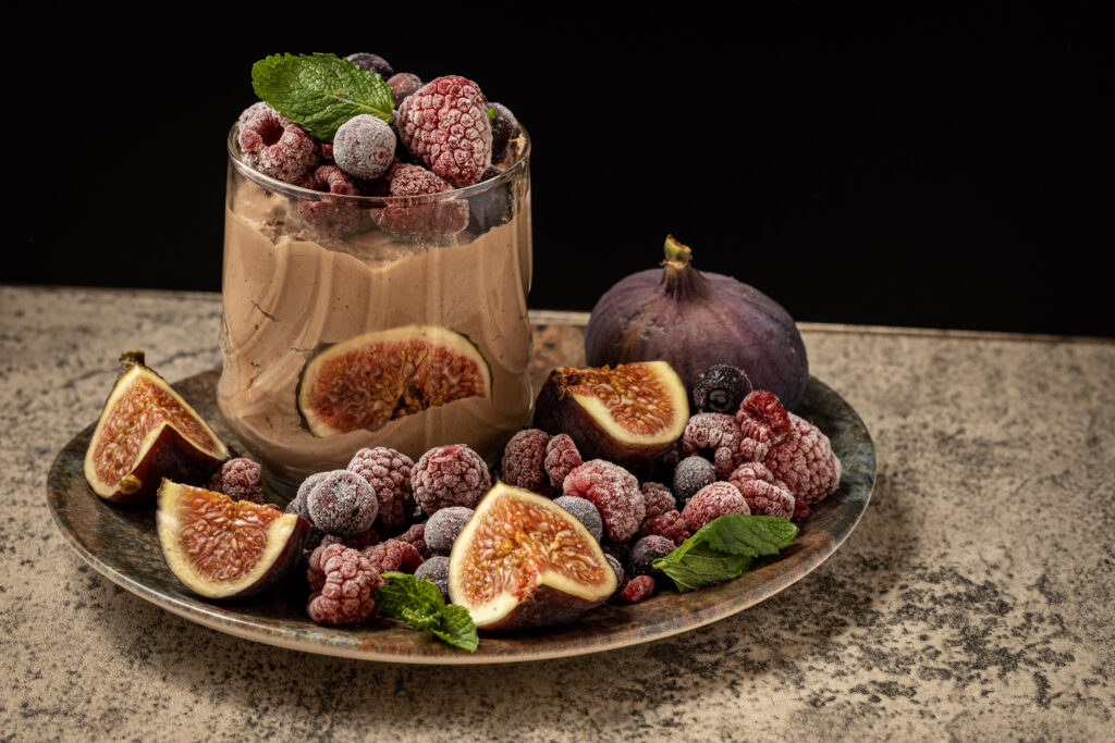Indulge in Creamy Chocolate Mousse Wallpaper with Fresh Berries
