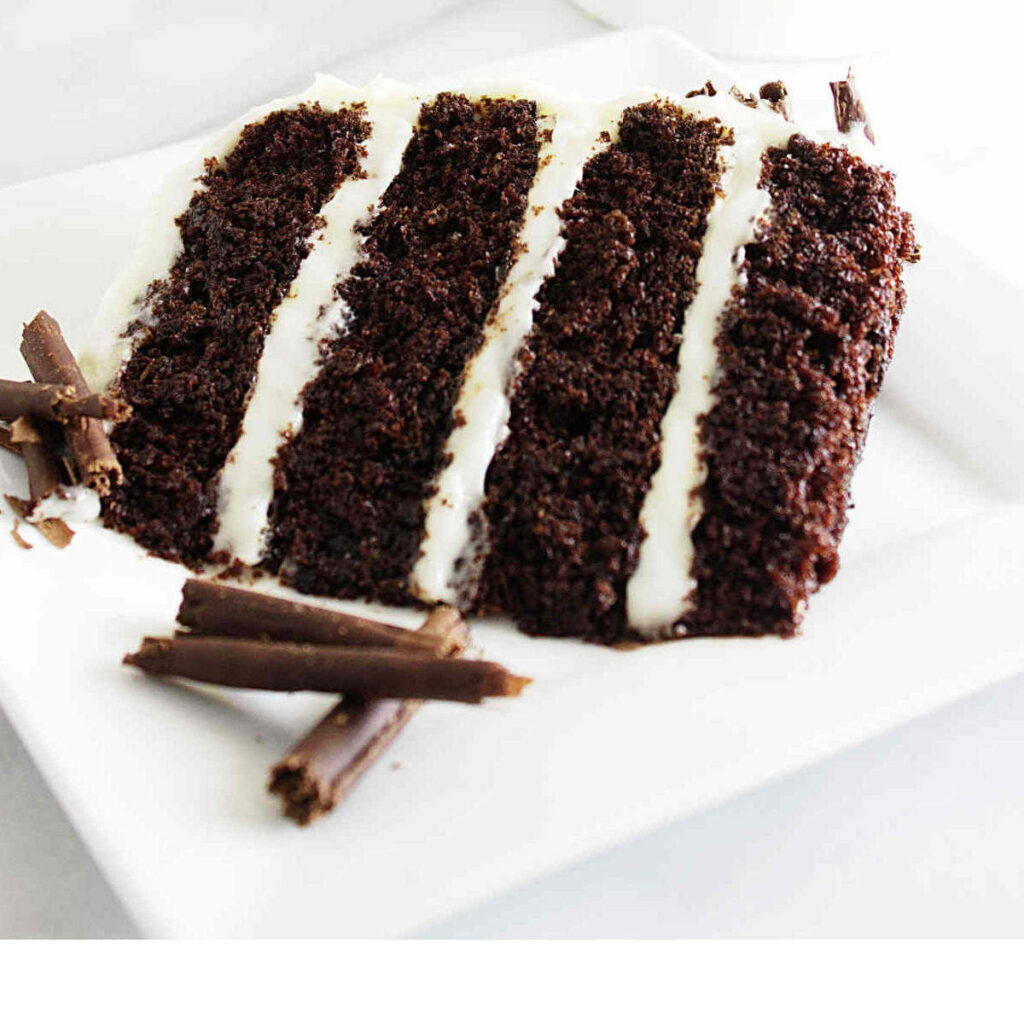 Indulge in a Crumby Chocolate Cake with Smooth Filling Wallpaper