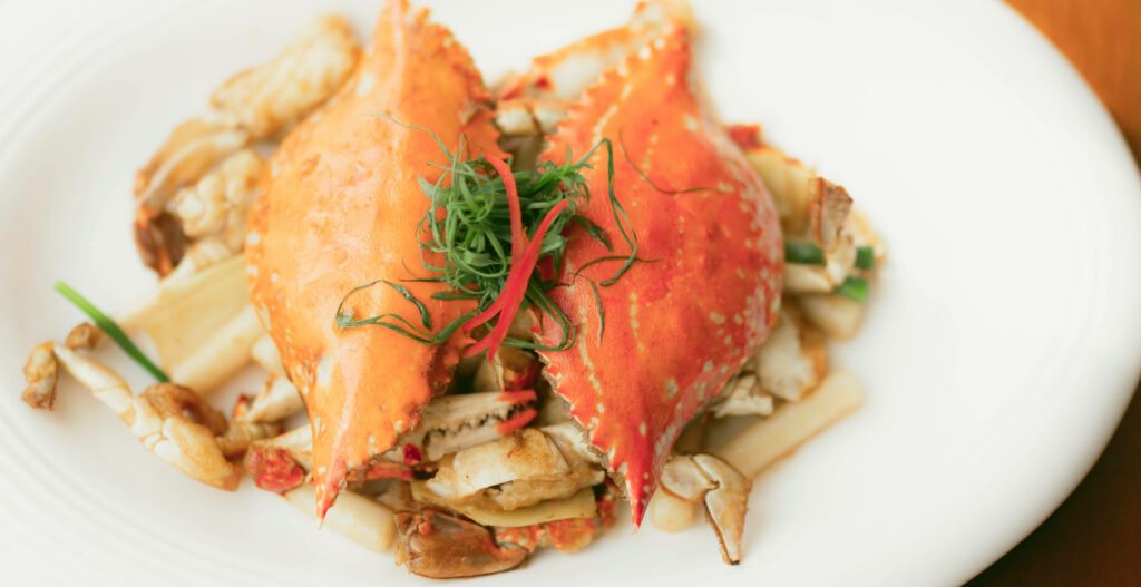 Vibrant King Crab Plate: A Feast for the Senses - Wallpaper Background