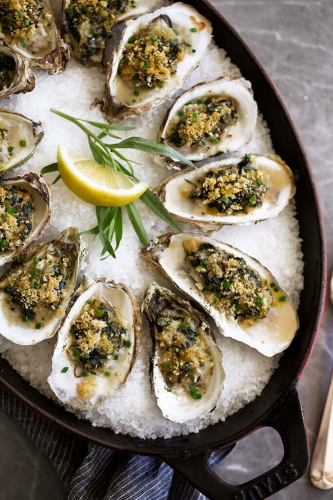 Elegant Oyster Rockefeller Wallpaper: Baked Oysters & Fresh Herbs