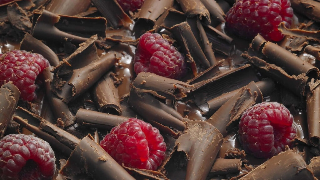 Fresh Raspberries & Chocolate Curls: Tempting Dessert Wallpaper
