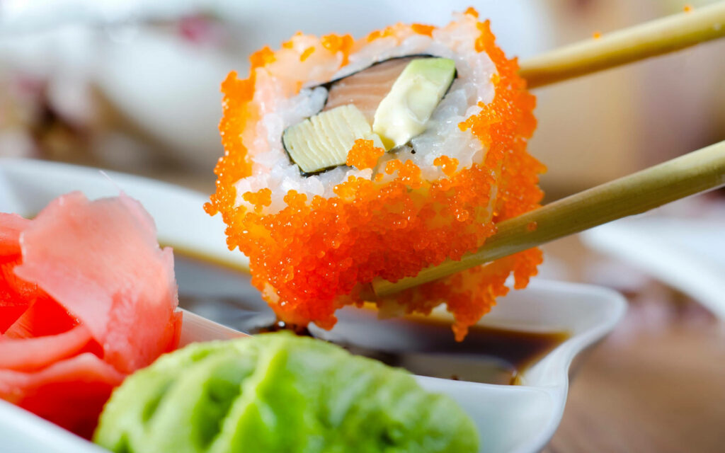 Vibrant Tuna Sushi Roll Wallpaper: A Delicious Culinary Delight