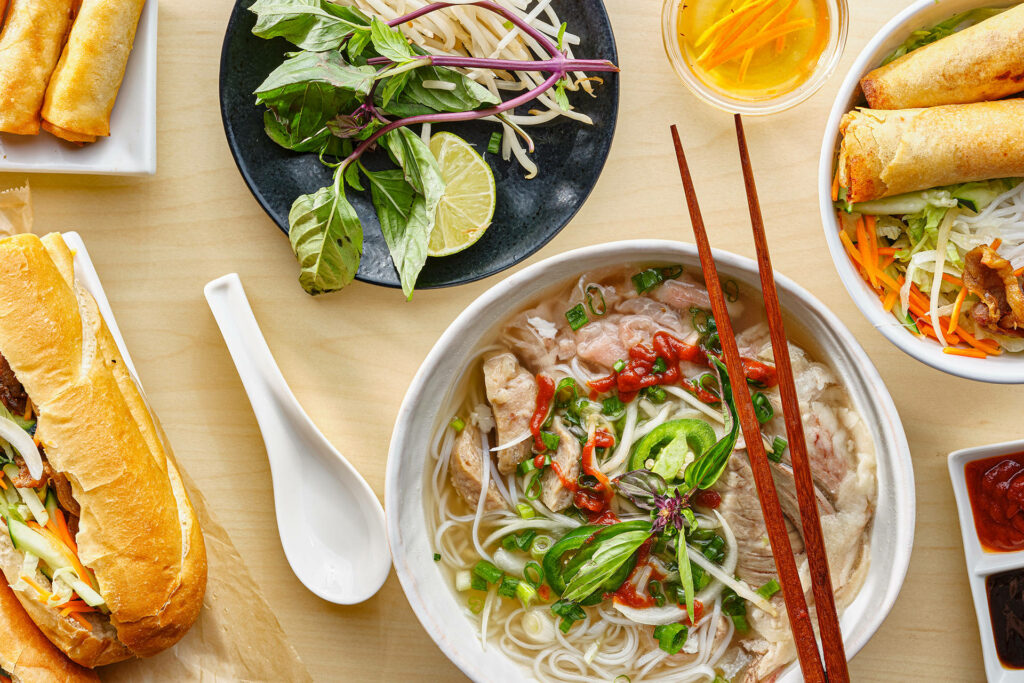 Stunning Vietnamese Pho Wallpaper: Fresh Herbs & Spring Rolls Delight