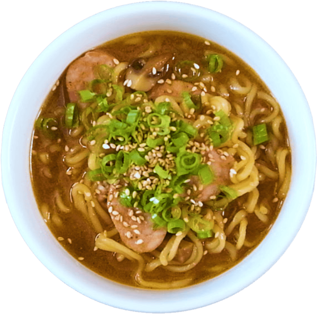 Delicious Asian Noodle Soup Bowl Wallpaper with Fresh Toppings