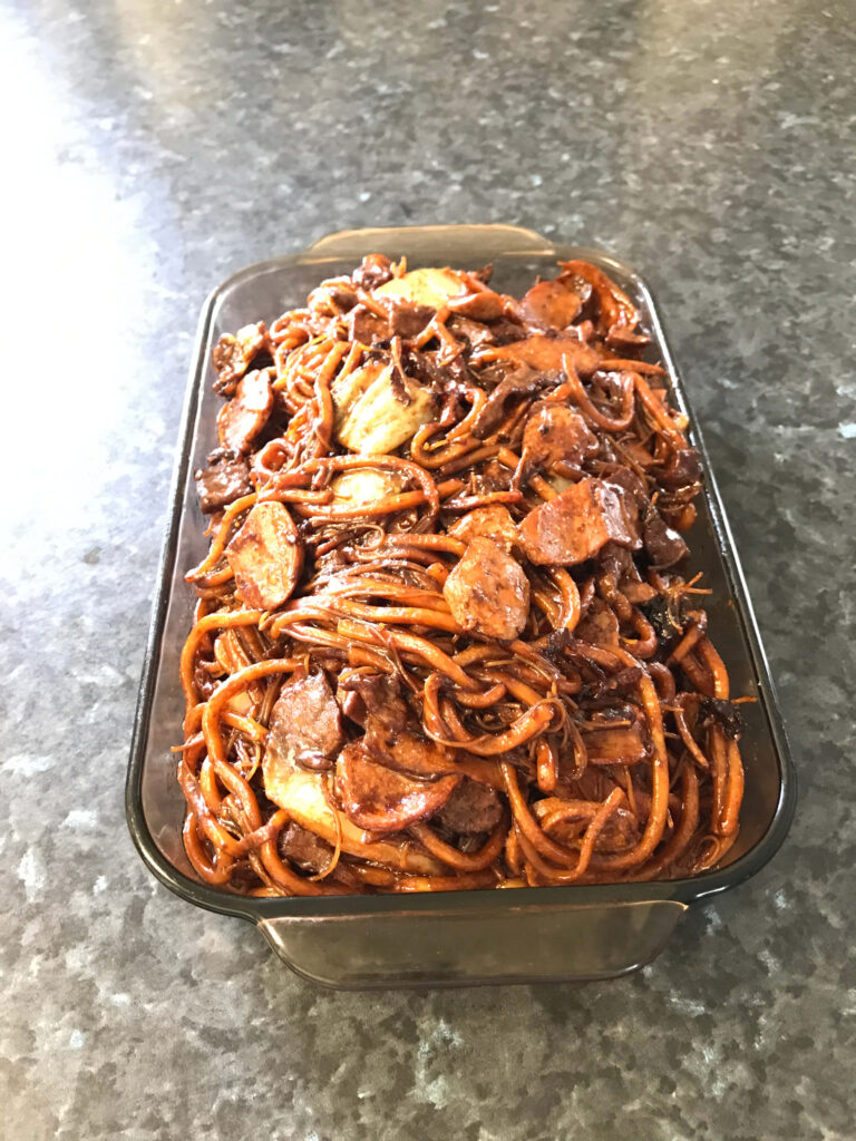 Mouthwatering Authentic Hokkien Mee on Marble Background Wallpaper