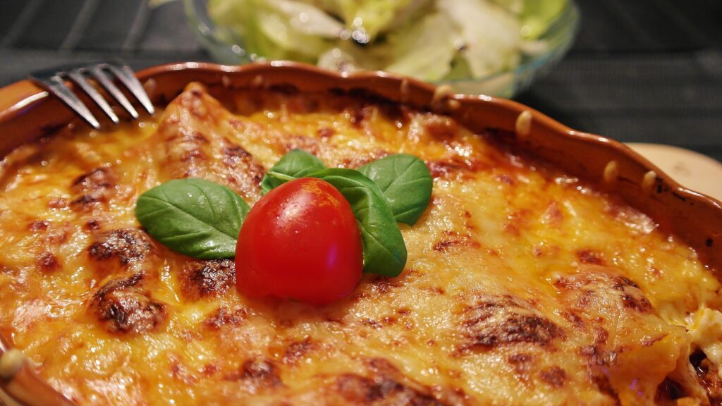 Delicious Baked Lasagna with Cheese & Fresh Salad - Wallpaper