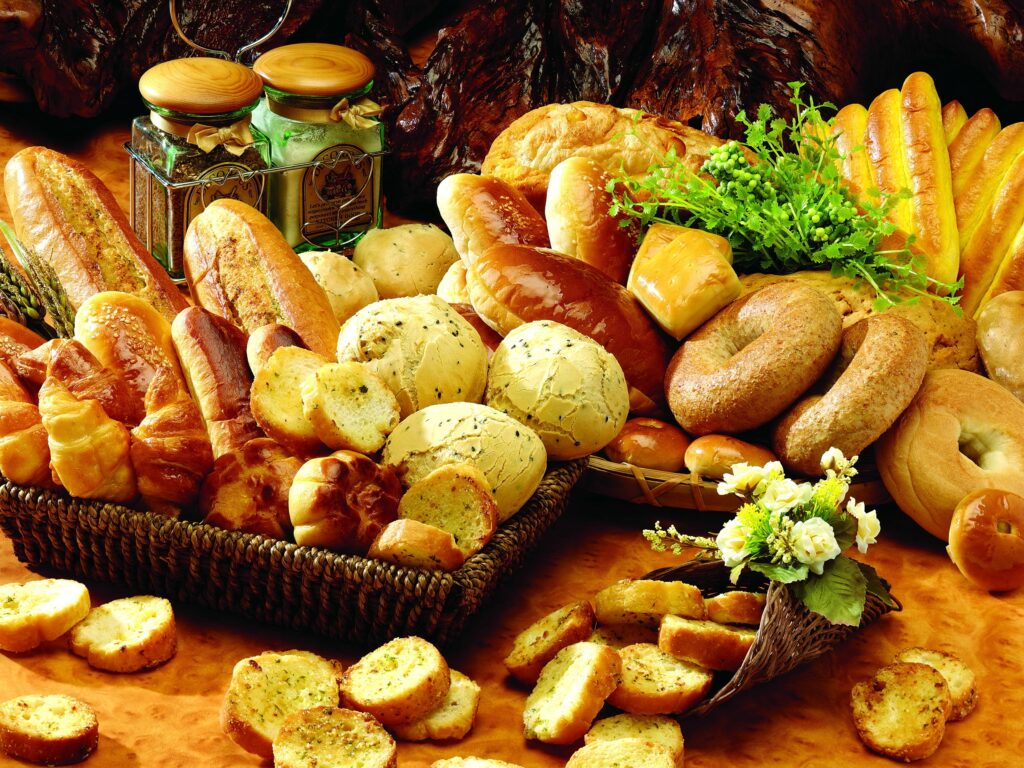 Freshly Baked Pastry Wallpaper - Delightful Bread & Rolls Background