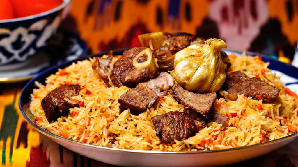 Vibrant beef biryani with tender beef and fragrant basmati rice in aromatic spices wallpaper