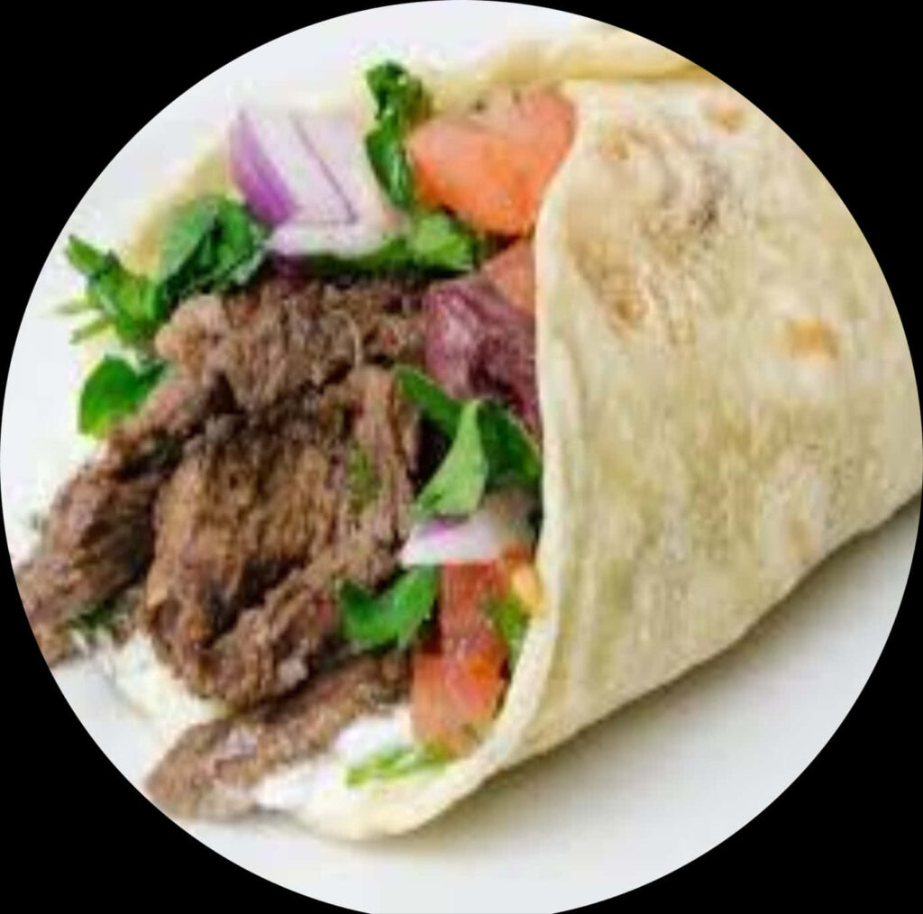 Delicious Beef Shawarma Wrap: Succulent Meat & Fresh Veggies Wallpaper