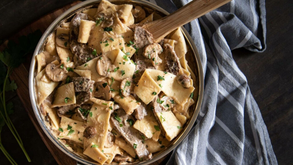 Delicious Beef Stroganoff: Classic Russian Dish with Creamy Sauce Wallpaper