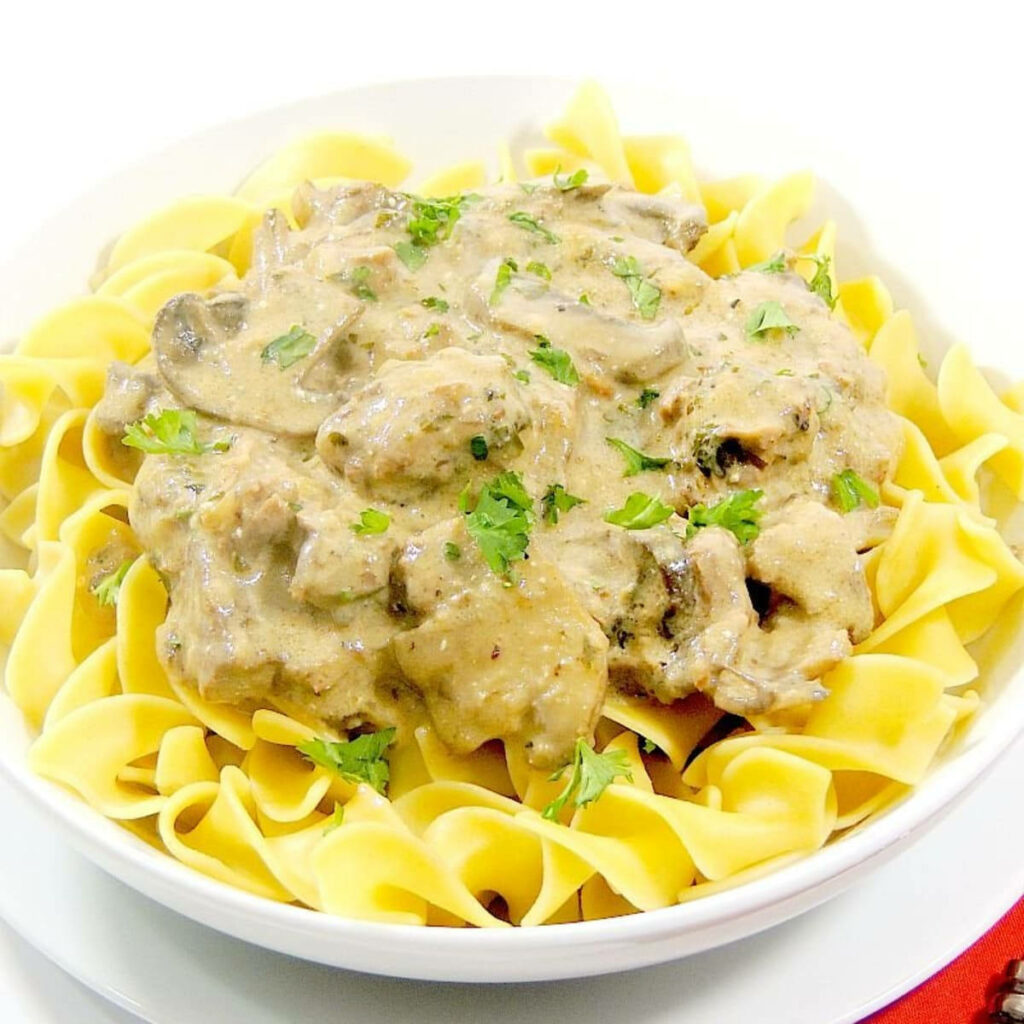 Beef Stroganoff Over Rotini Pasta - Creamy Sauce Wallpaper