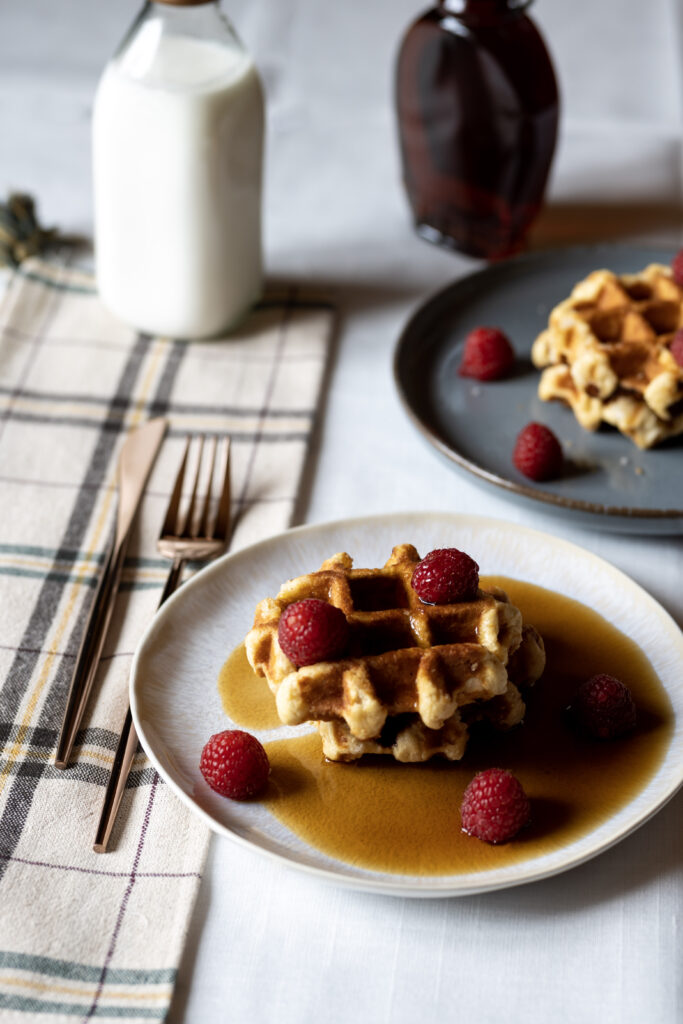 Delicious Belgian Waffles with Raspberries & Maple Syrup Wallpaper