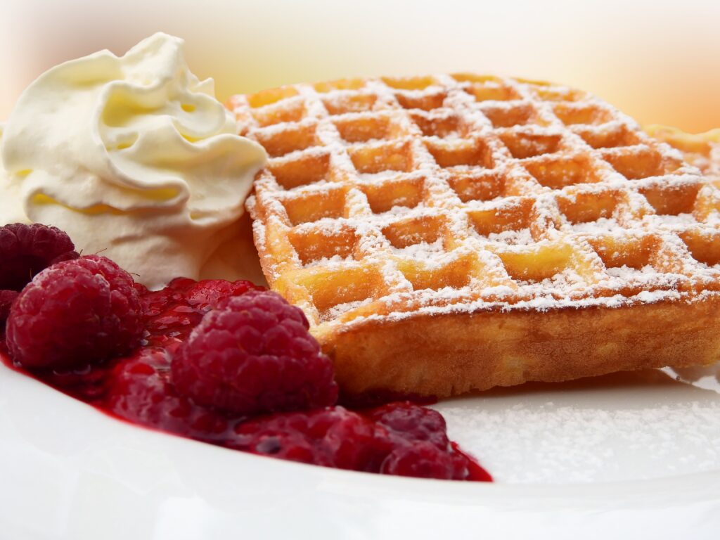 Delicious Belgian Waffles with Berries & Cream - Wallpaper Background