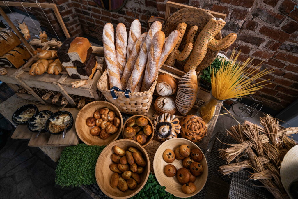 The Art of Baking: A Mouthwatering Still Life in Bread Heaven Wallpaper