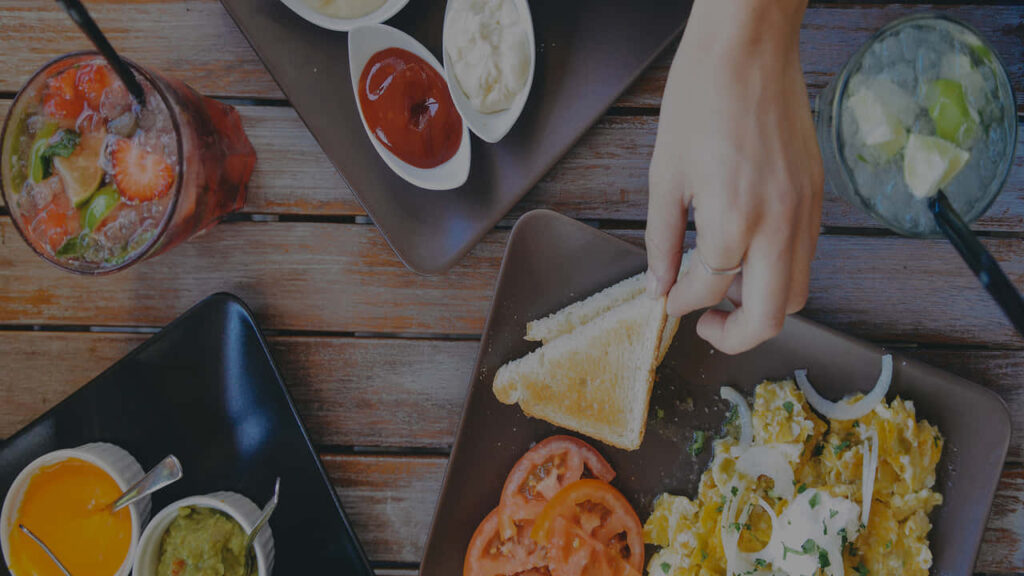 Delicious Breakfast Spread: Toast, Eggs & Fresh Ingredients Wallpaper