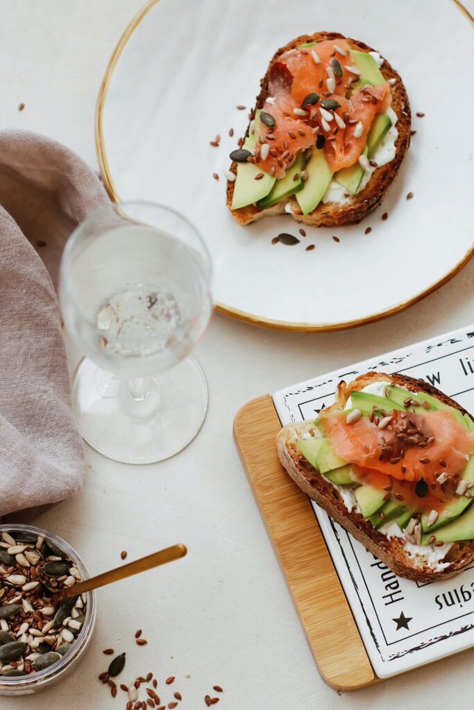 Elegant Breakfast Wallpaper: Open-Faced Sandwiches & Avocado Delight