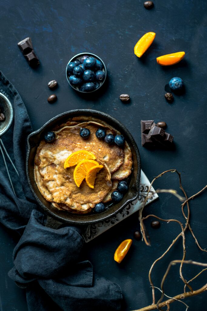 Pancake Fantasy: Blueberries & Chocolate on Dark Wallpaper Background