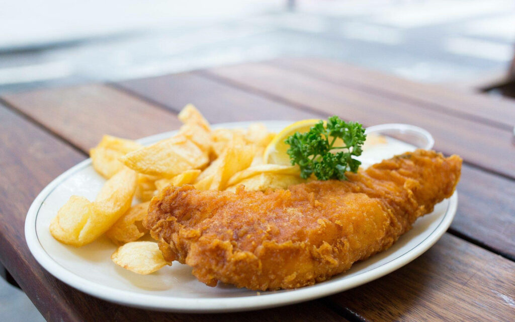 Classic British Fish and Chips Wallpaper: Crispy, Golden Delight