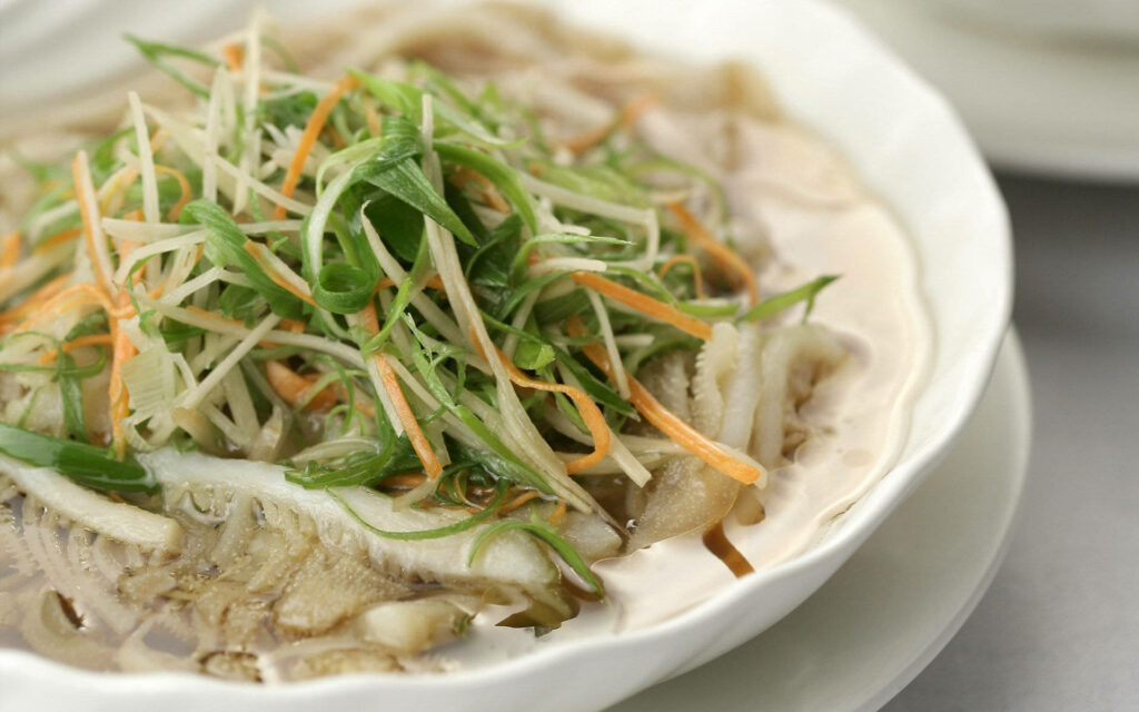 Delicious Broth Dish with Veggies - Close-Up Wallpaper Background