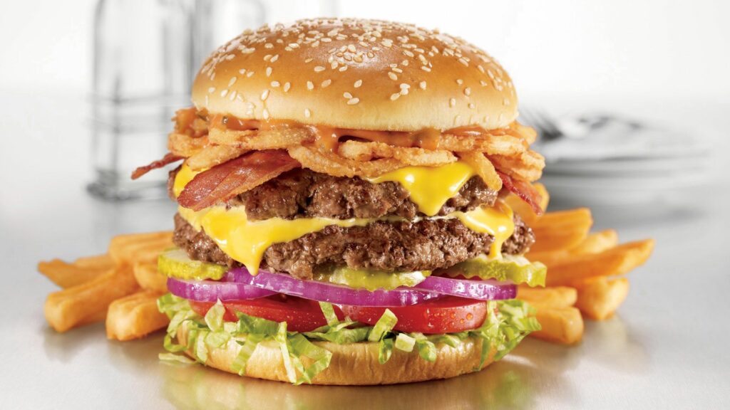 Juicy Burger Delight with Crispy Chicken & Fries - Wallpaper Background