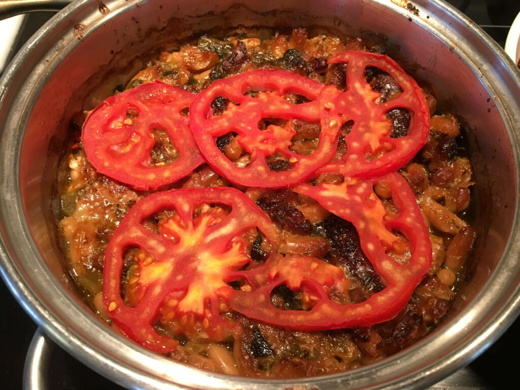 Vibrant Cassoulet Wallpaper: Hearty Dish with Summer Squash & Tomatoes