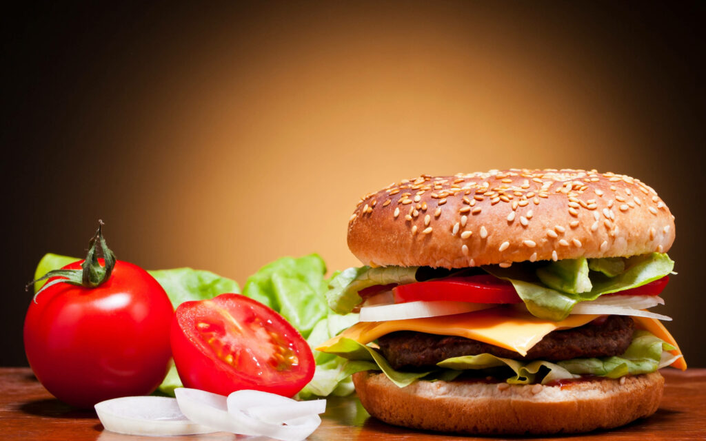 Delicious Cheeseburger with Fresh Toppings - Wallpaper Background