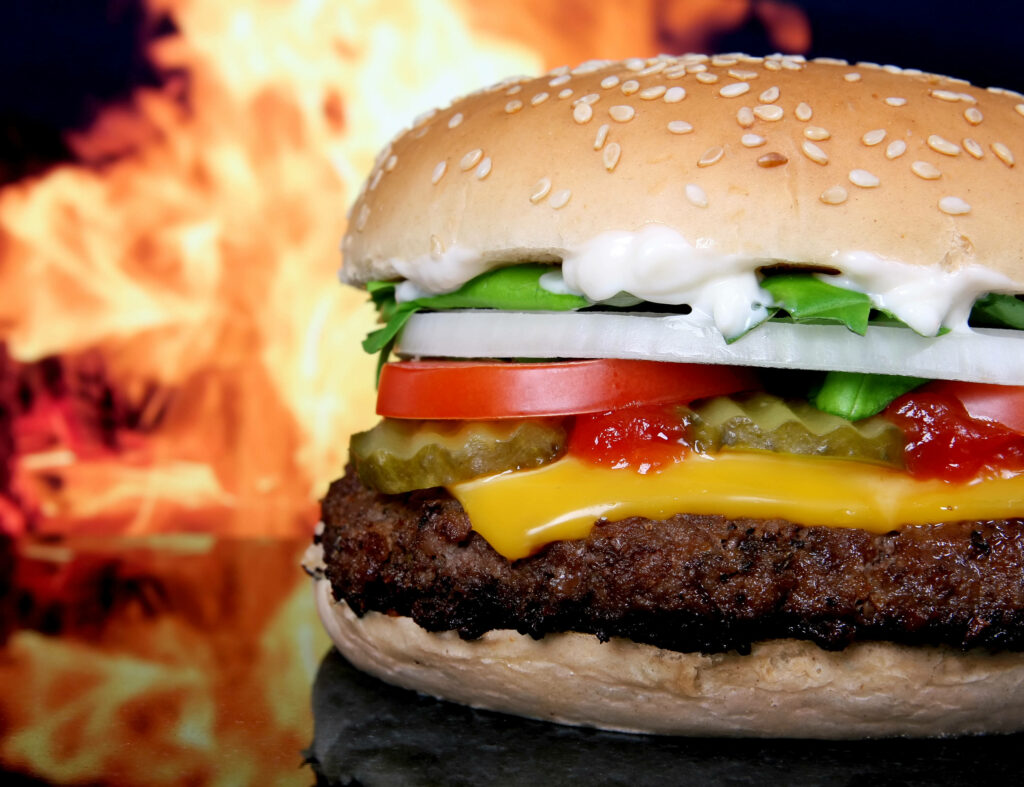 Fiery Cheeseburger Wallpaper: Juicy Beef, Fresh Veggies & Cheese
