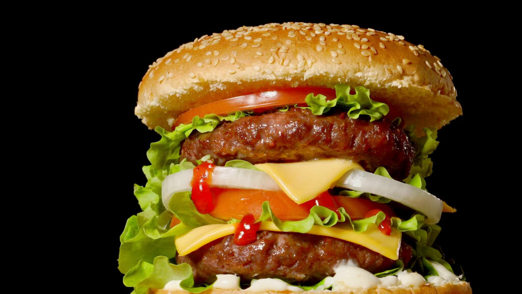 Delicious Cheeseburger Wallpaper: Sesame Bun, Fresh Toppings & Ketchup