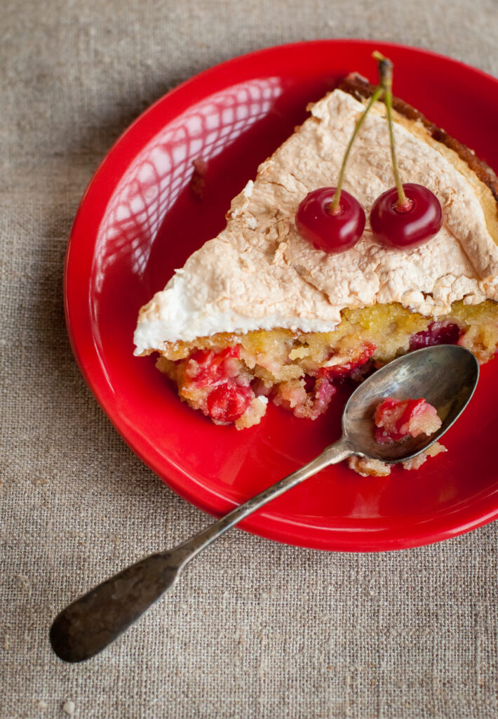 Cherry Cake Slice with Cream on Red Plate - Wallpaper Background