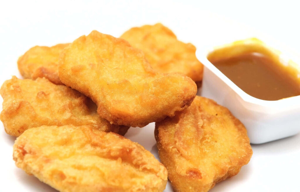Crispy Chicken Nuggets & Savory Gravy Wallpaper Background